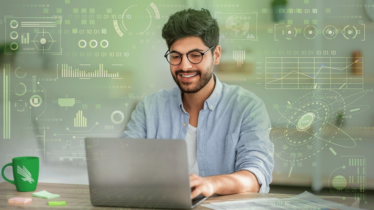 A young professional working on a laptop with digital data visualizations overlayed 