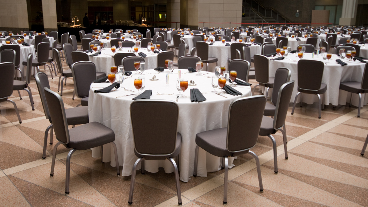 A formal dining setup with round tables